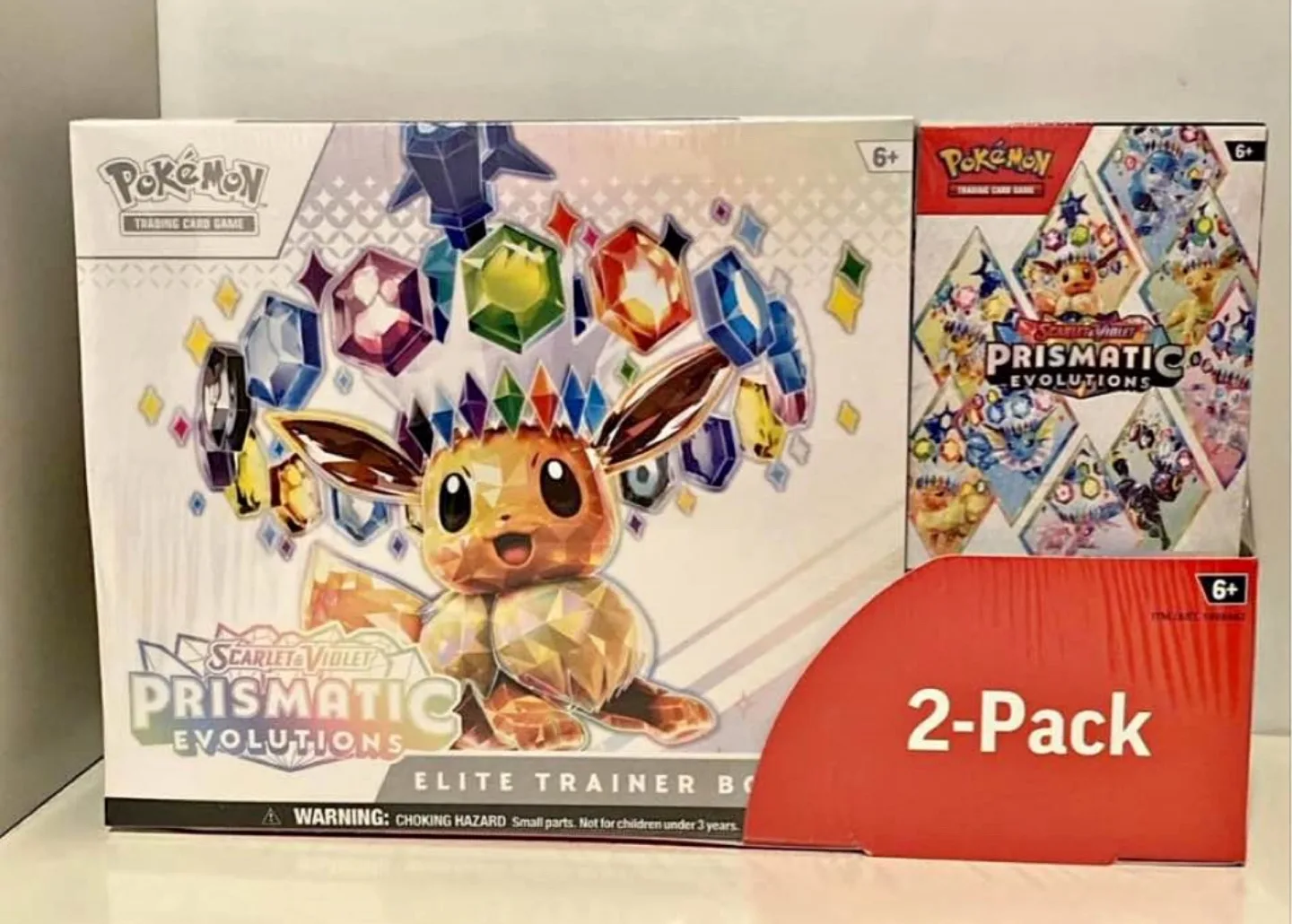 Prismatic Evolution ETB + Booster bundle 2 pack