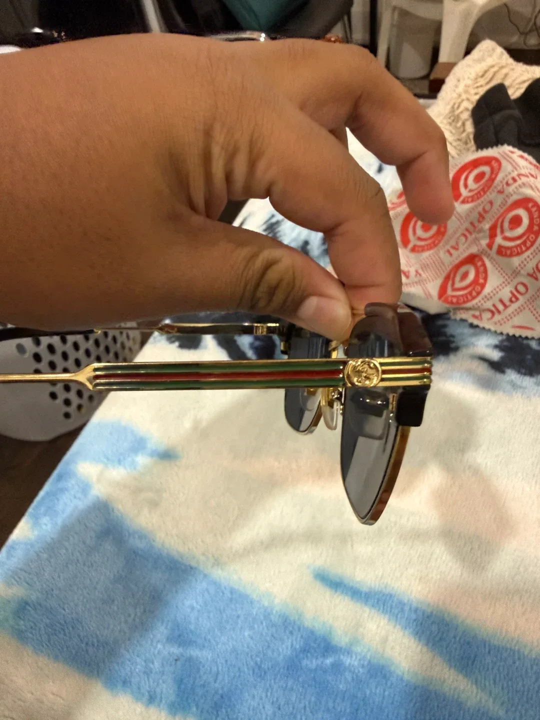 Gucci Sunglasses Black and Gold image indicator(2)