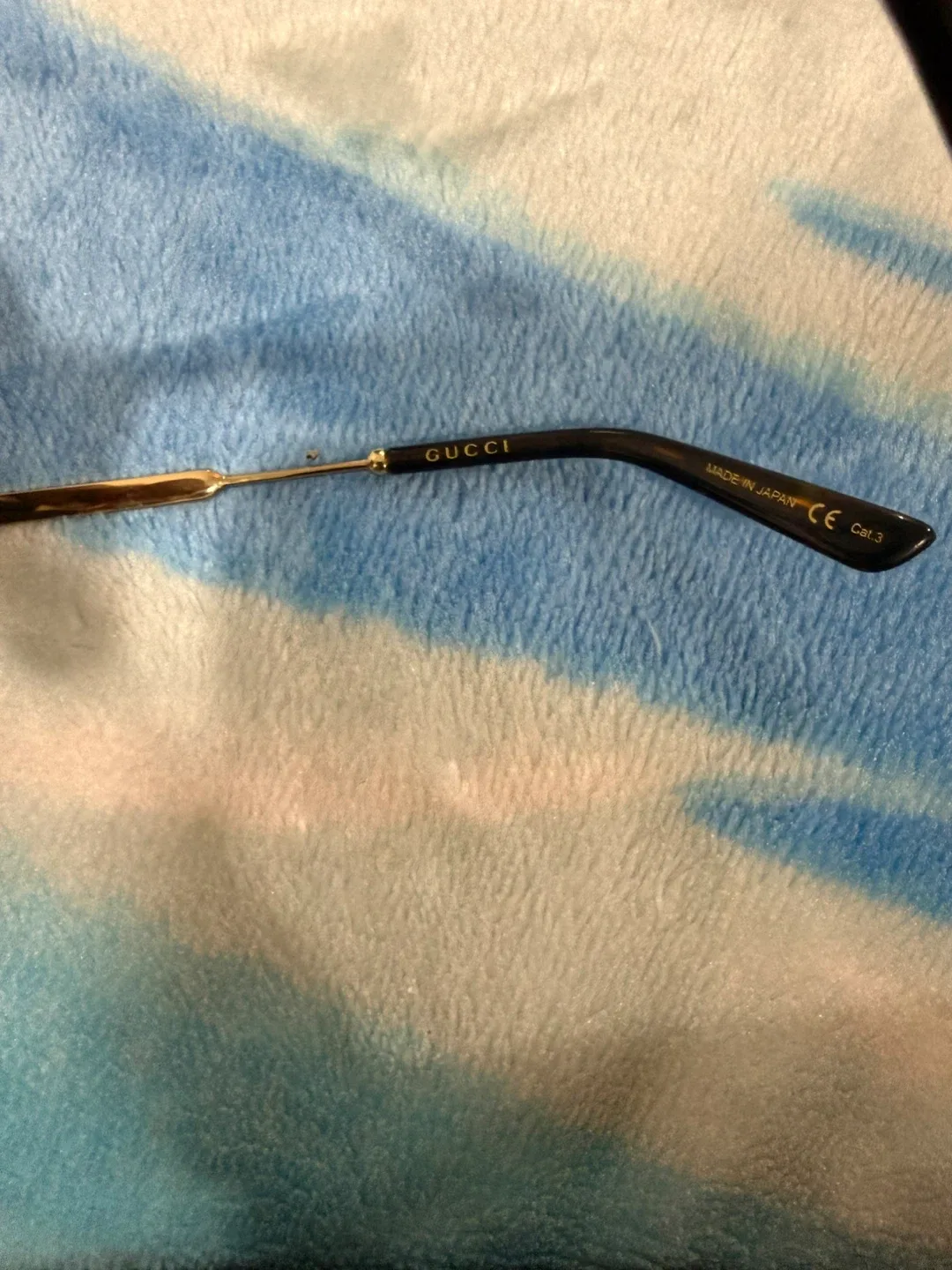 Gucci Sunglasses Black and Gold image indicator(4)