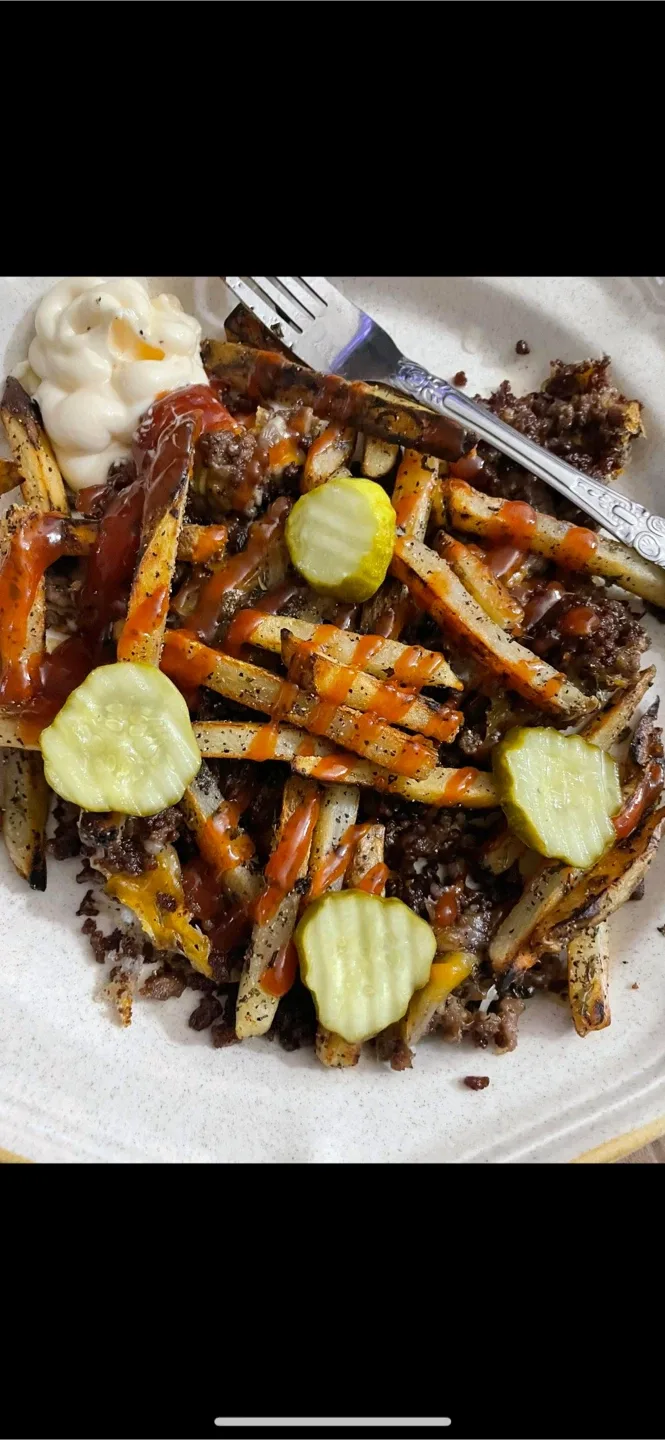 Chopped cheese over fries