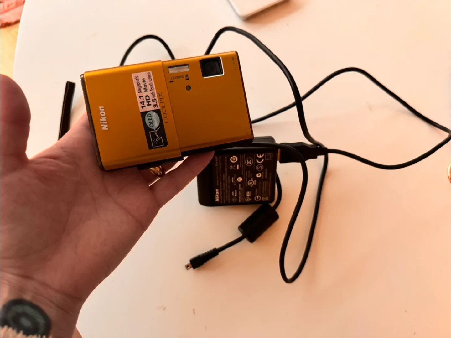 Nikon COOLPIX S6100 14.1 MP Digital Camera - Orange image indicator(10)