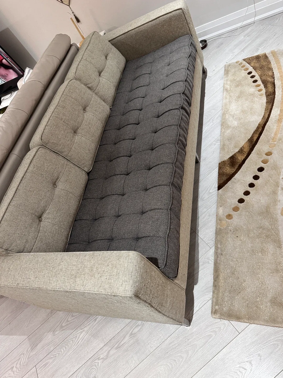 Beige Sofa with Grey Cushion