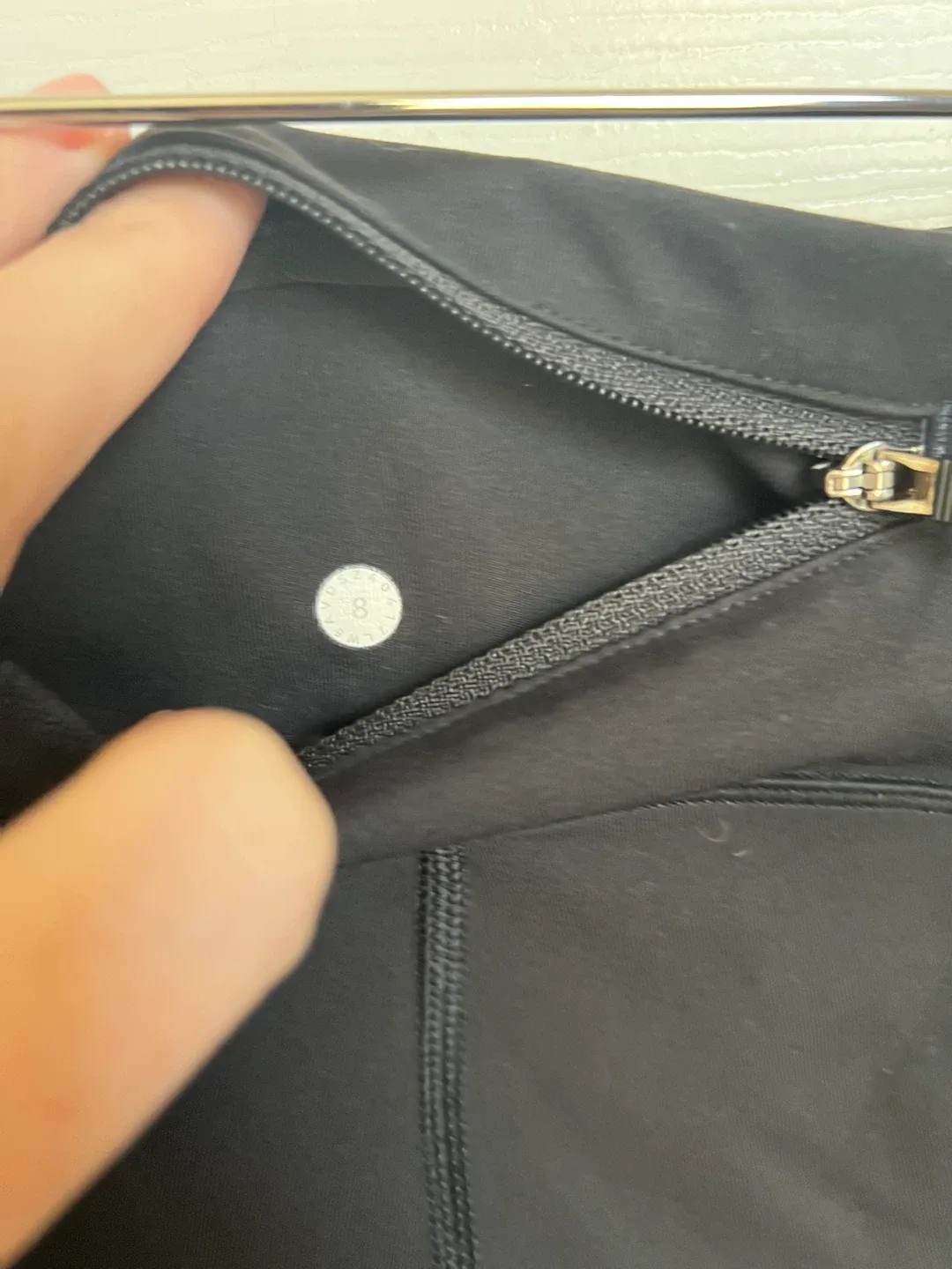 size 8 black full length lulu leggings with pockets image indicator(4)