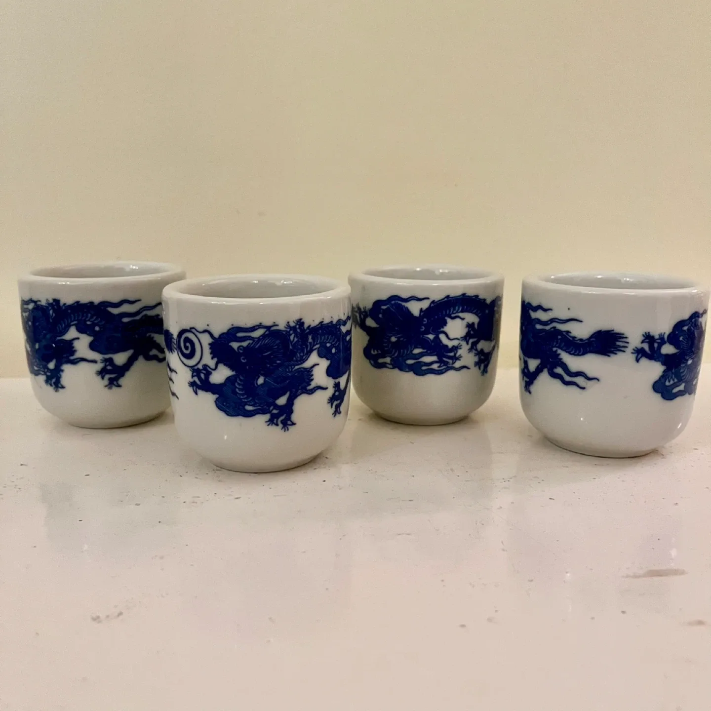 4 porcelain dragon tea cups