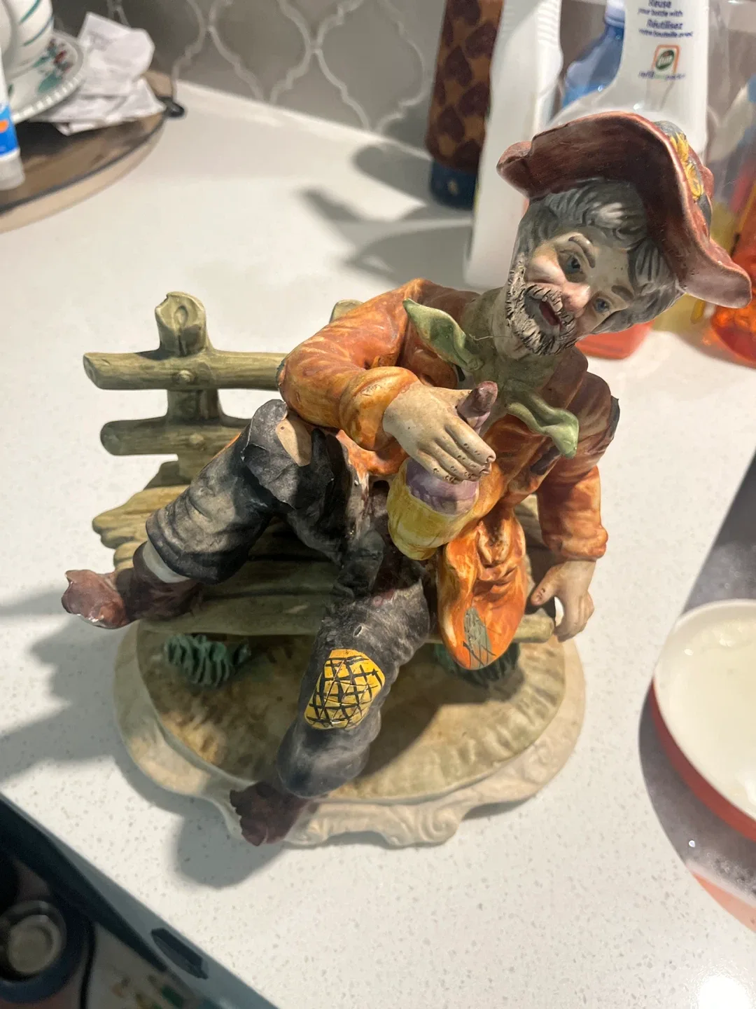 Vintage Capodimonte Hobo Figurine on Bench with bottle
