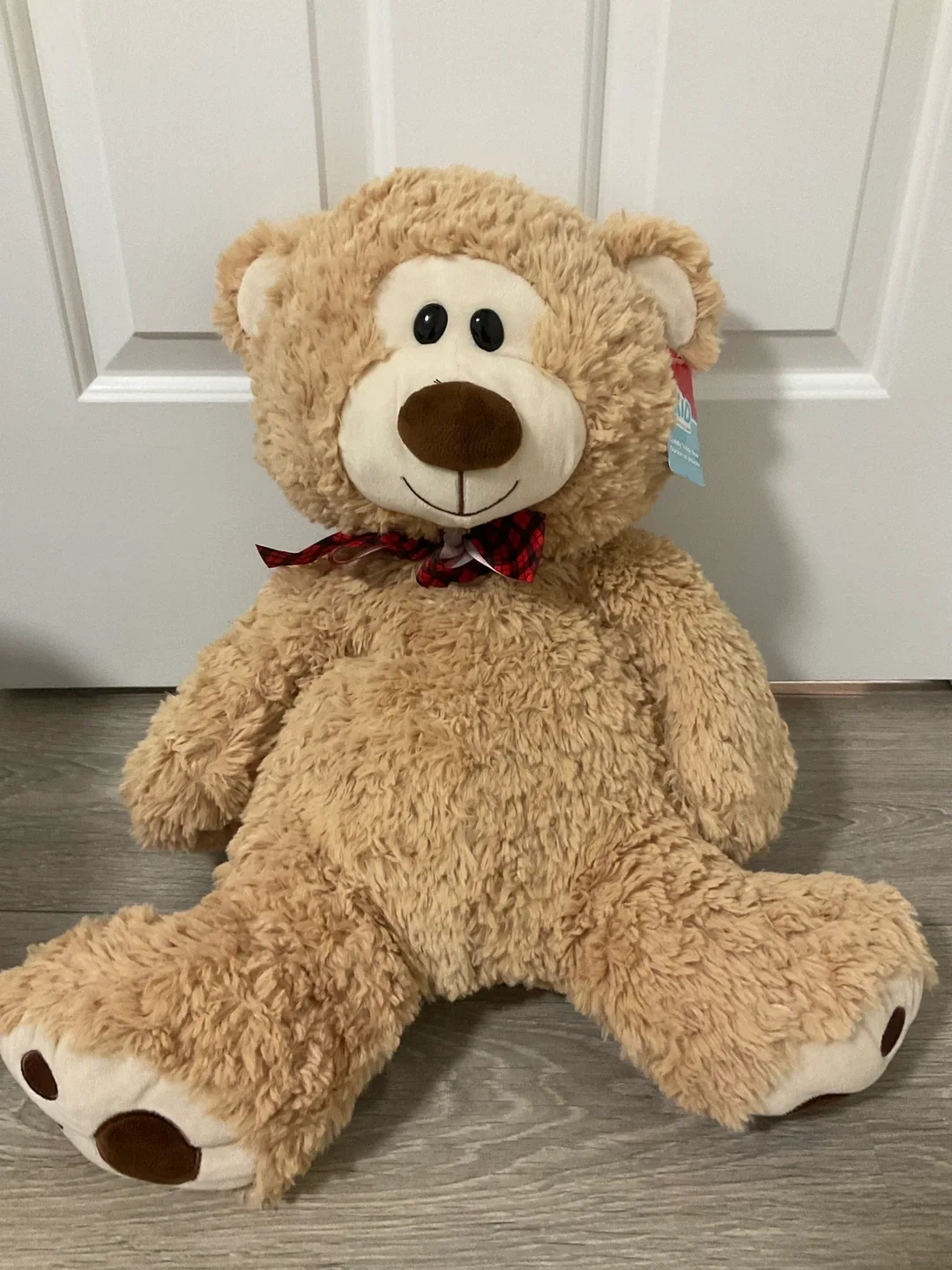 Large Tan Teddy Bear with Red Bow