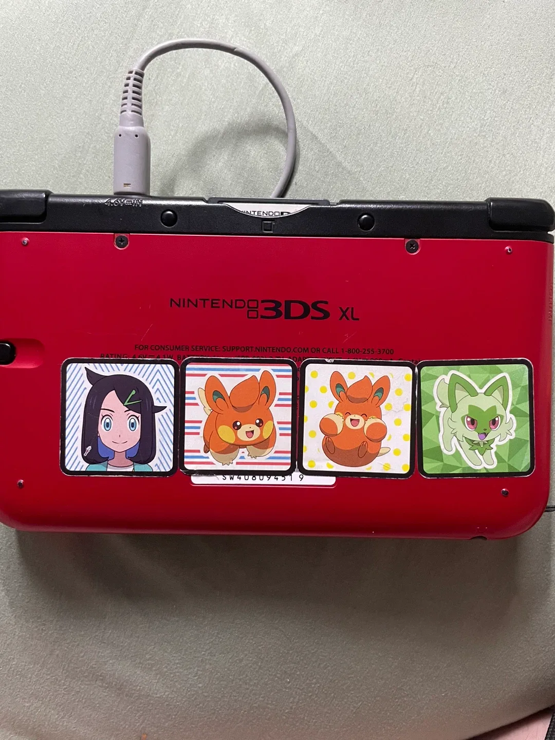 Nintendo 3DS XL with Pokémon Games and Stylus image indicator(2)