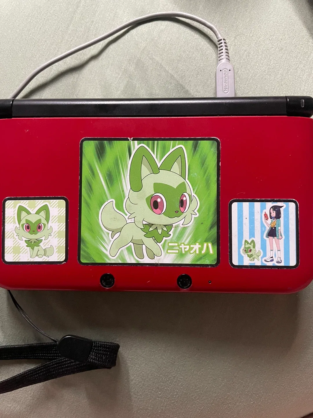 Nintendo 3DS XL with Pokémon Games and Stylus