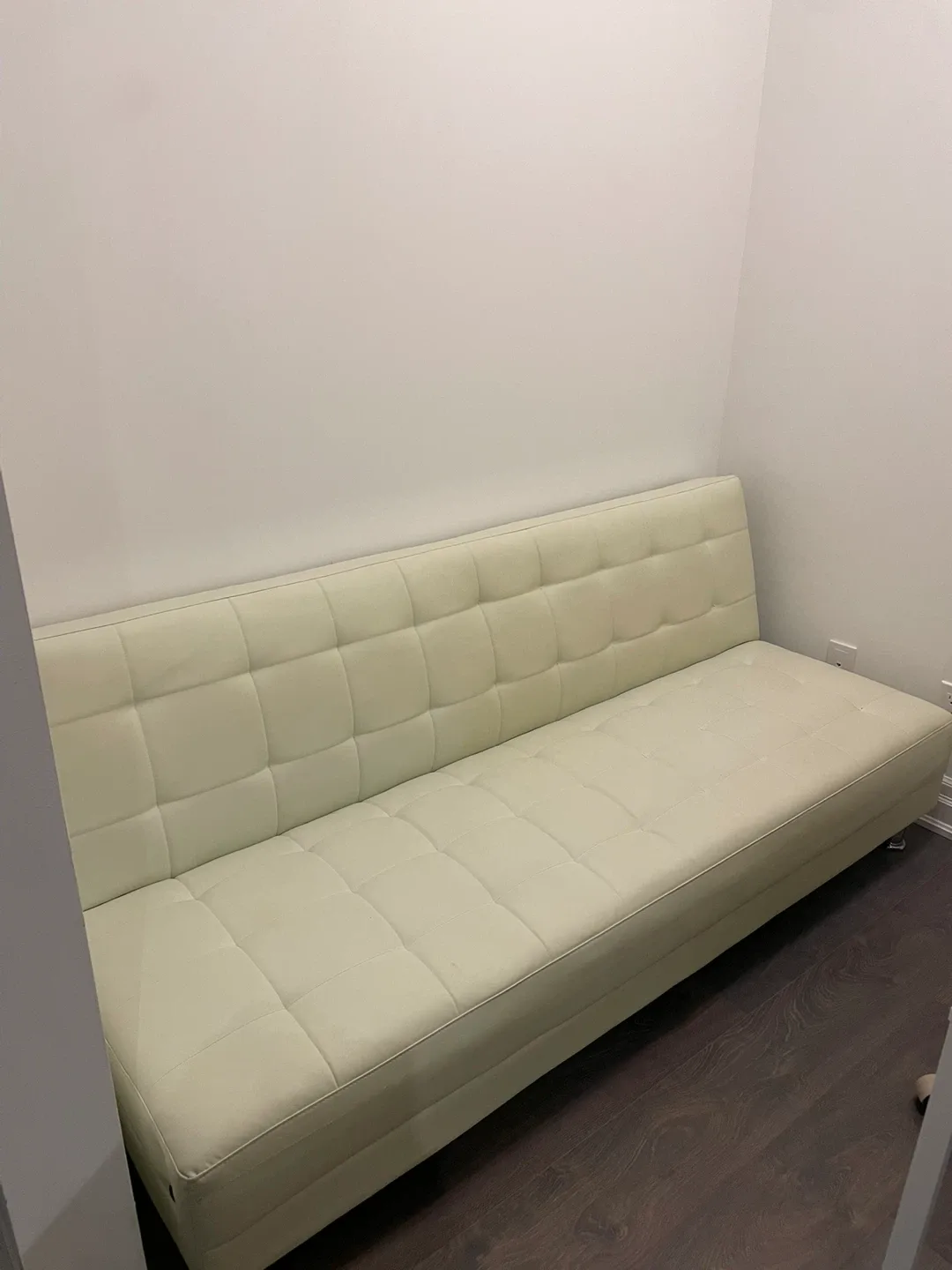 Cream-coloured Futon Couch