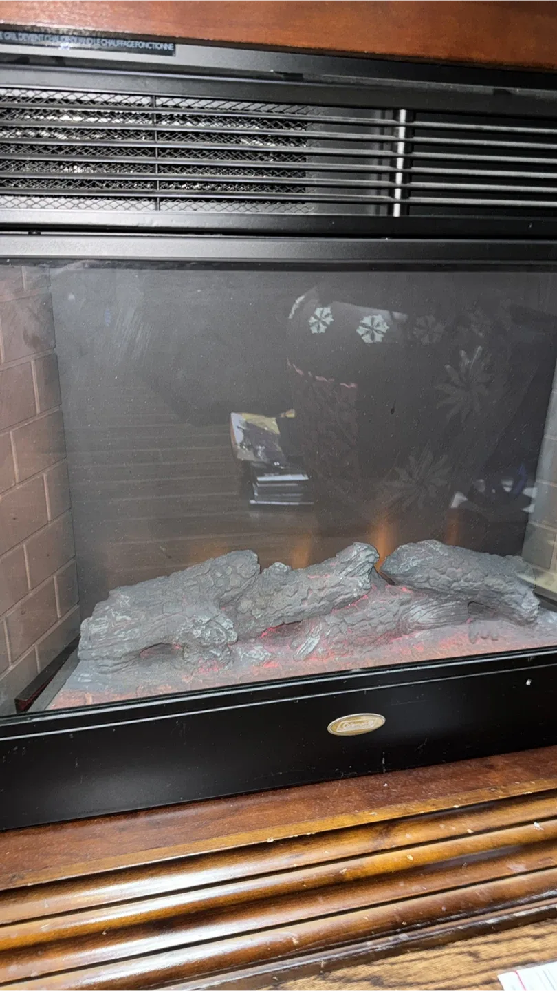 Like new Electric Fireplace- selling as moving to smaller place