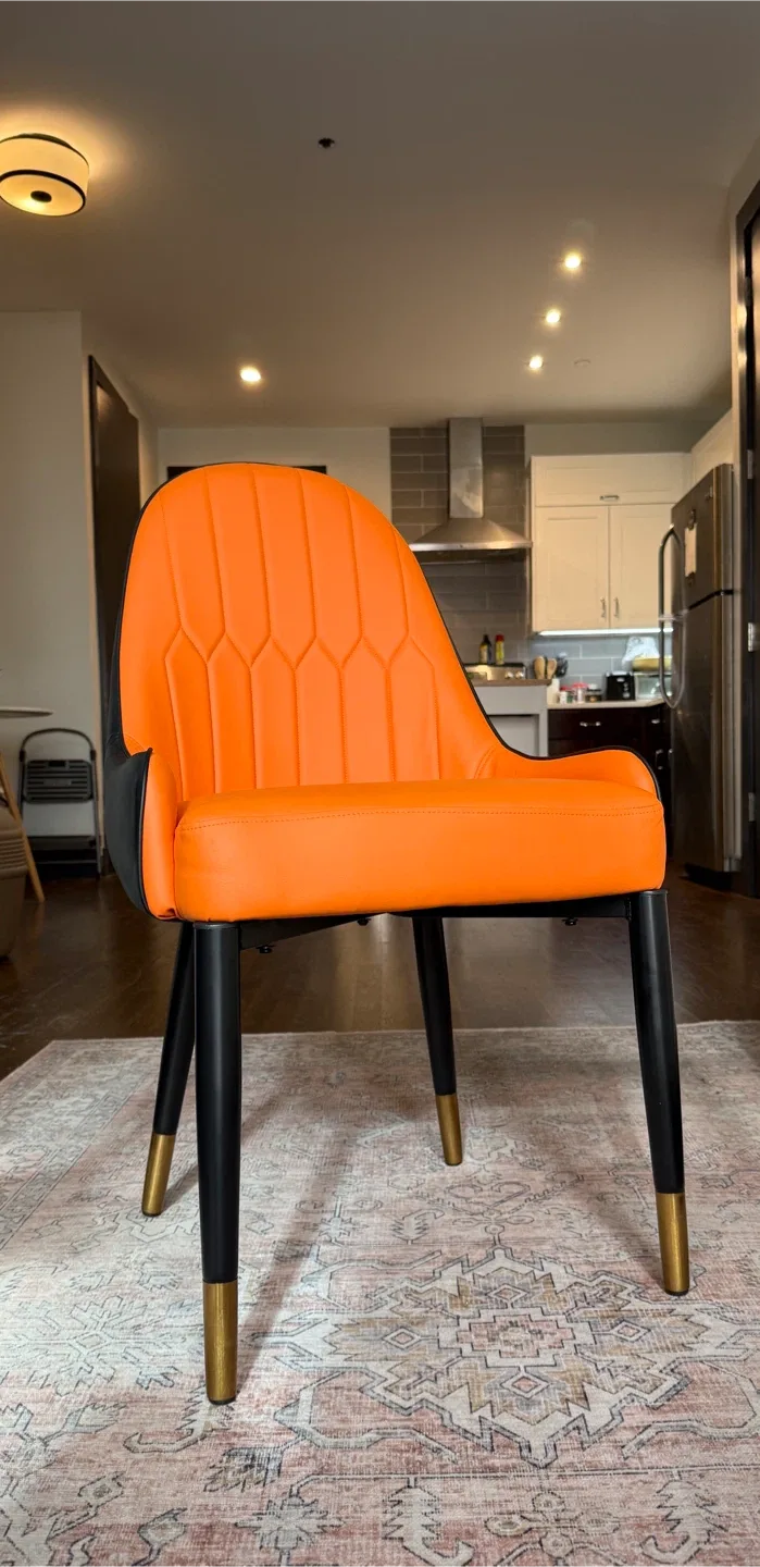 3 Mid century orange and black faux-leather chairs (NEW)