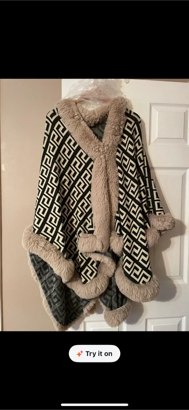 Poncho.  brand new one size fits all