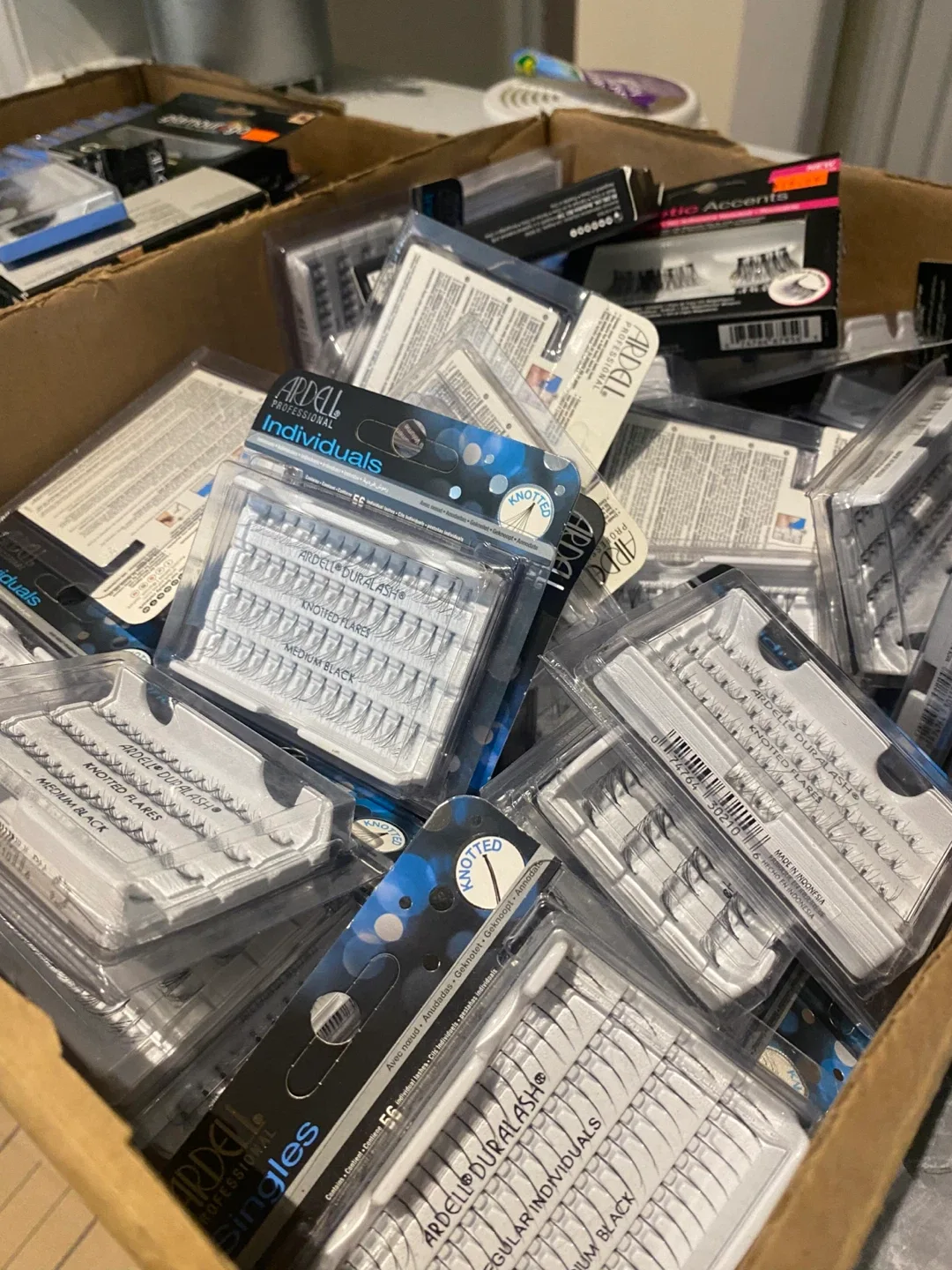 Beauty Supply Assorted Makeup Lot - Lashes, Brushes, Eyeshadow image indicator(2)