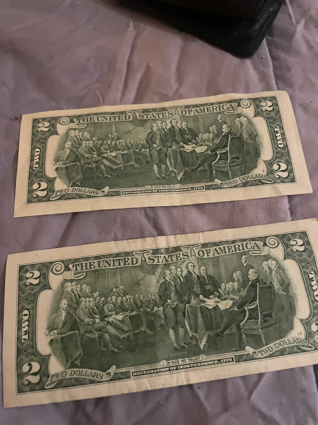 Two Dollar Bills & 1978 Half Dollar Coin image indicator(2)