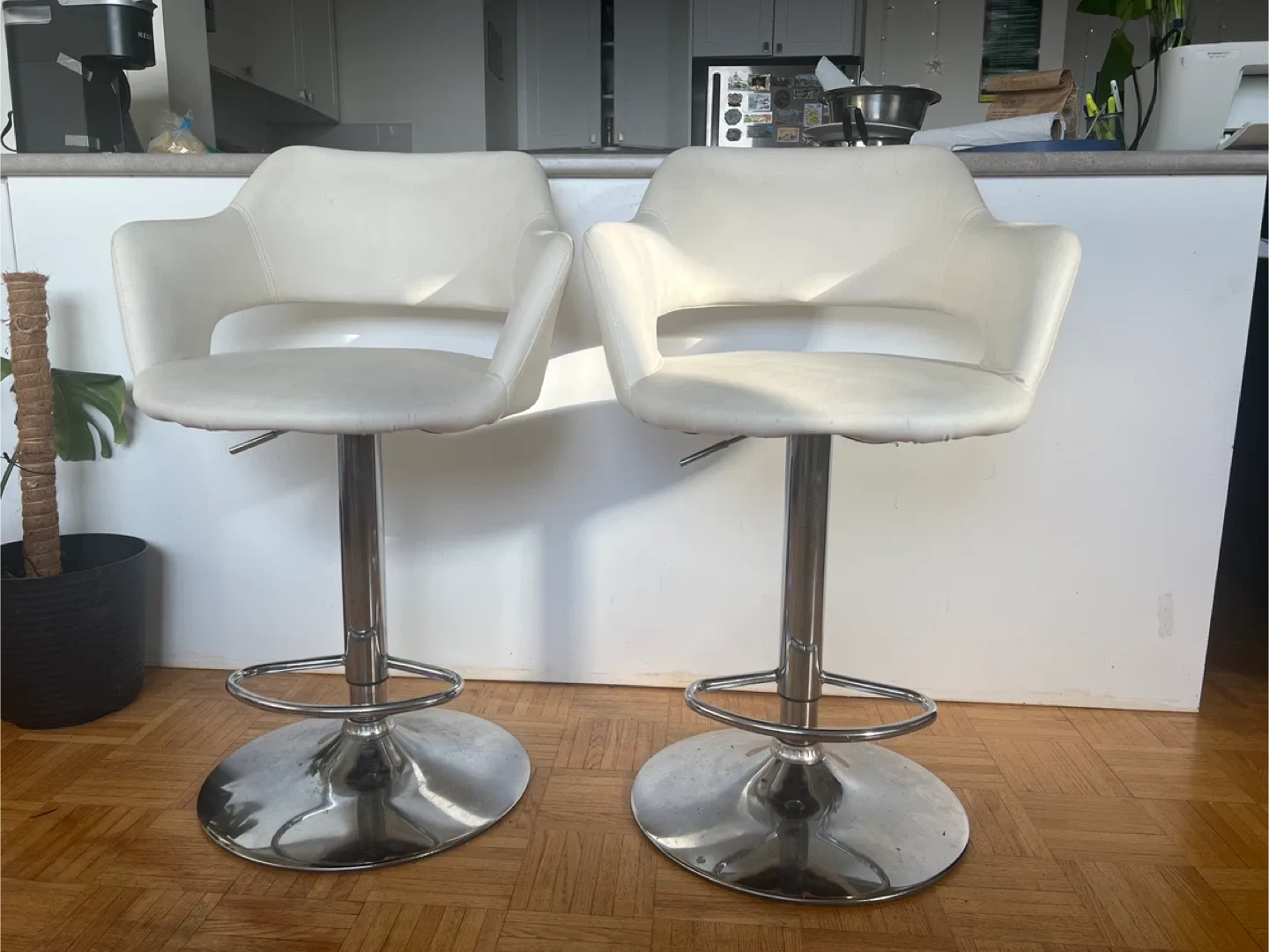 Pair of White Swivel Bar Stools image indicator(2)