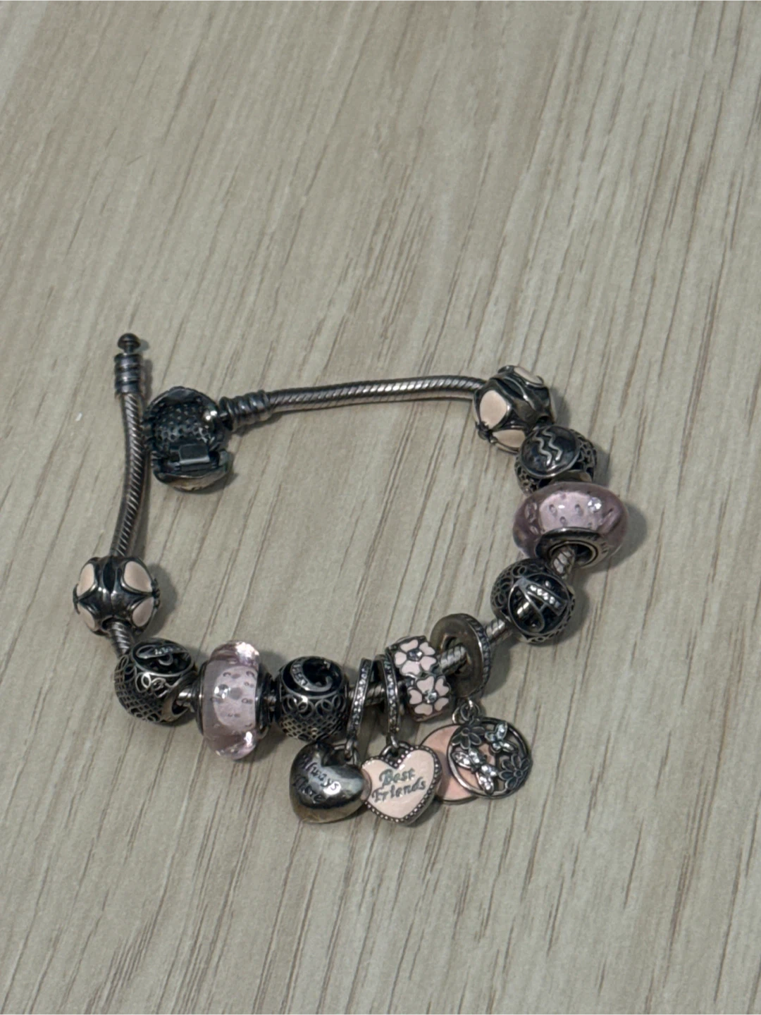 Pandora bracelet authentic with all beads as shown in the pic
