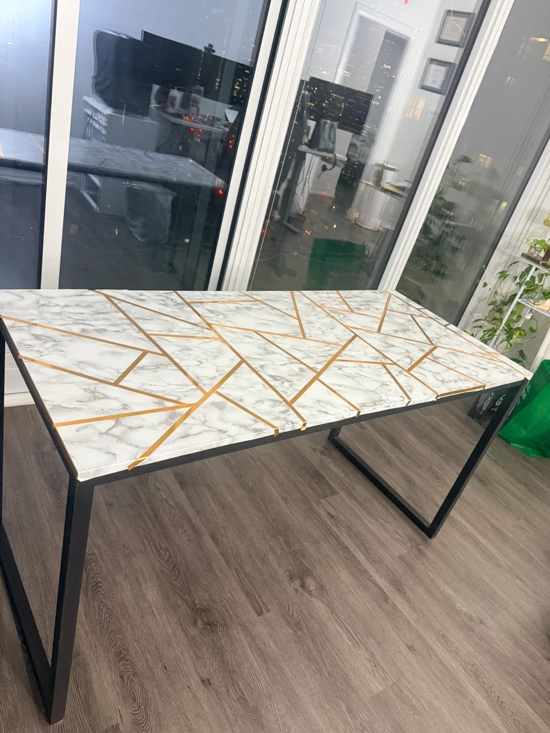 Metal legs wooden table.