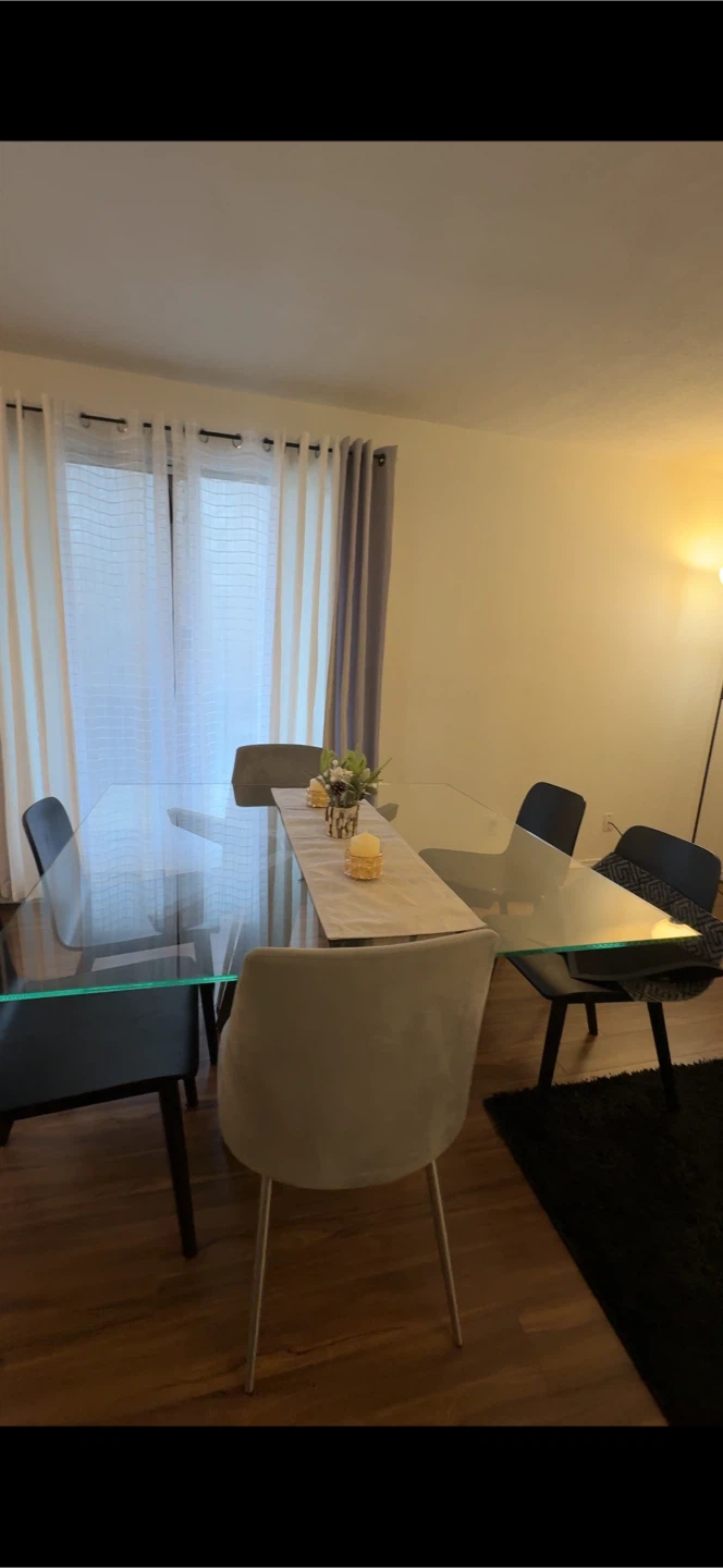 50% Price Drop on Glass Dining Table with 4 Black Chairs