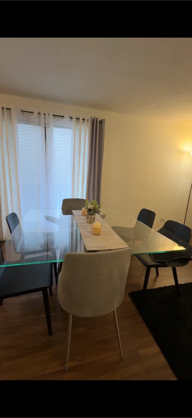 Glass Dining Table with 4 Black Chairs