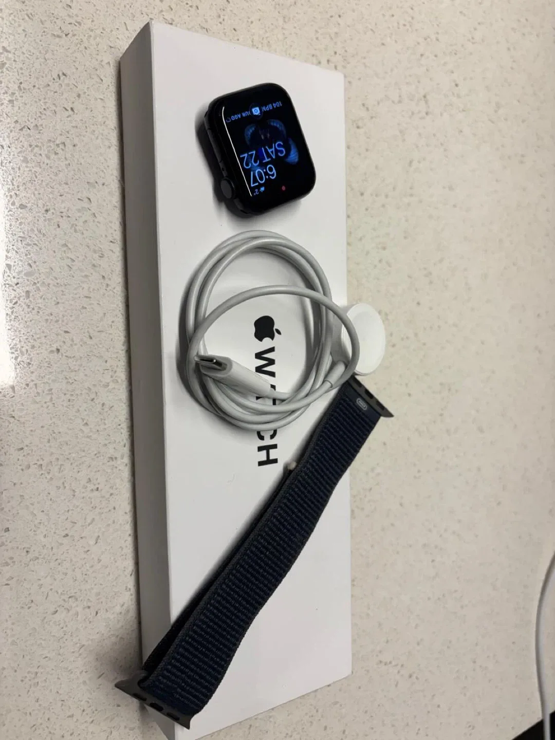 Apple Watch with charger and band