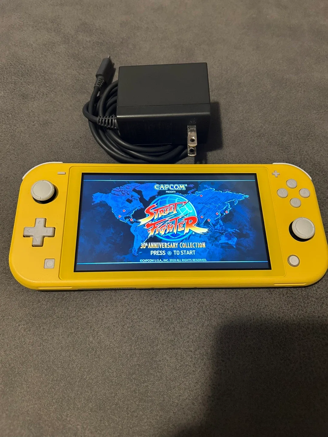 Nintendo Switch Lite - Yellow with Charger