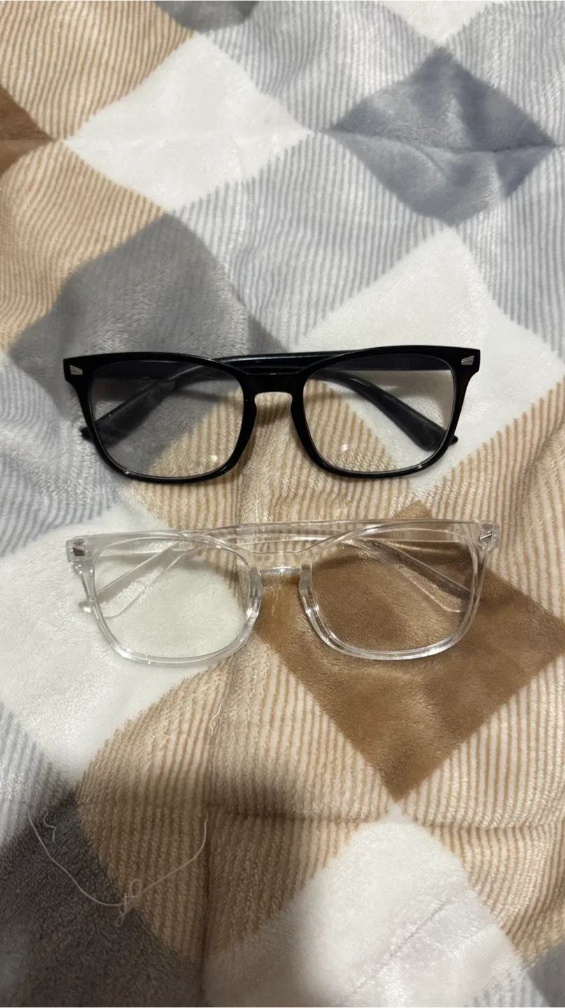 Two pairs of glasses - Black and Clear