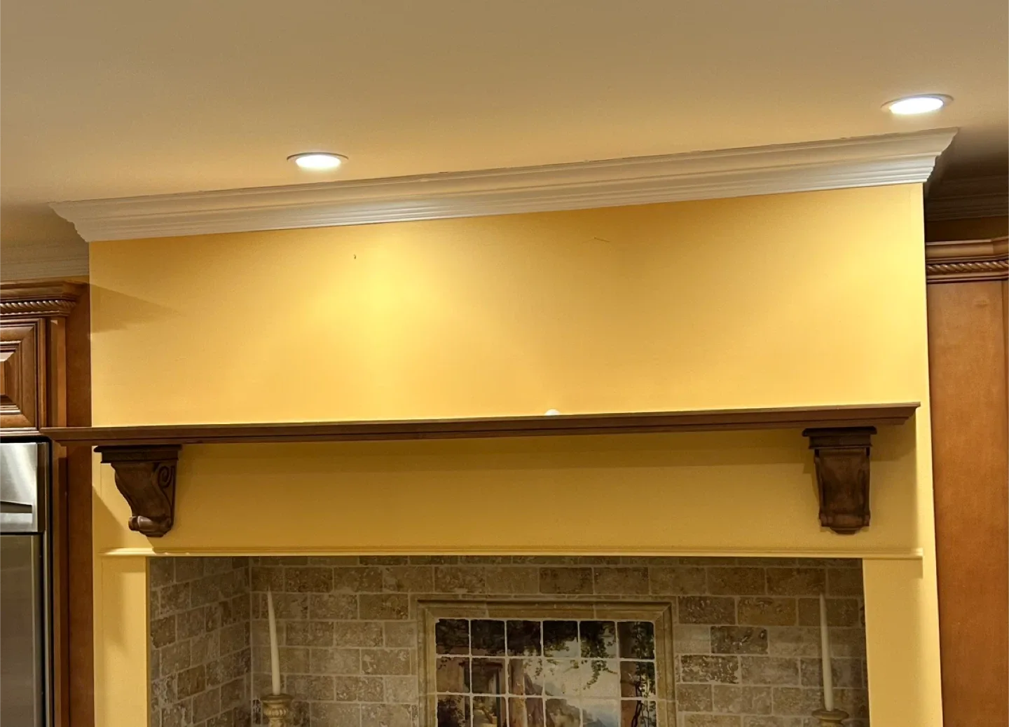 Mantle with wooden corbels