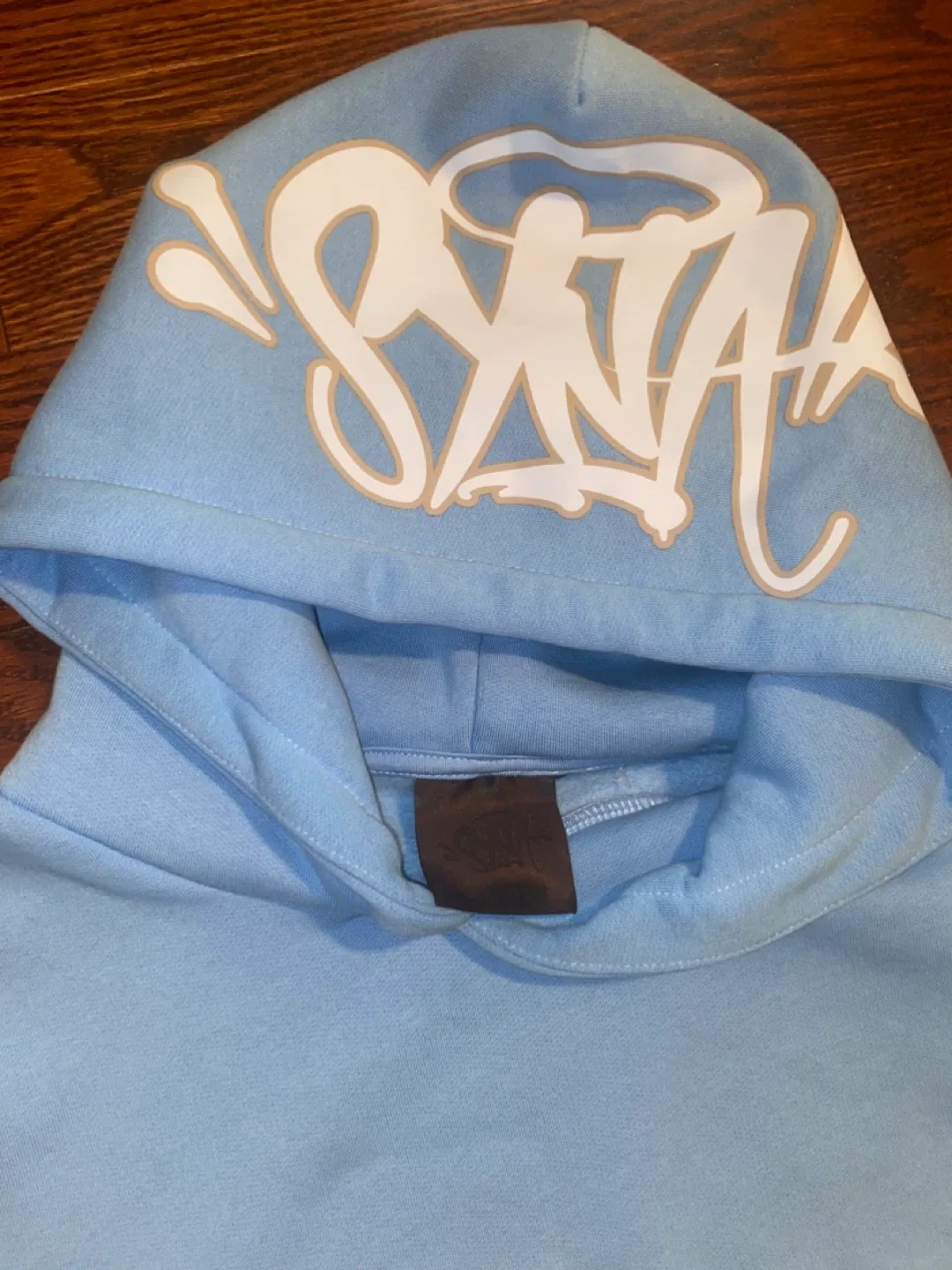 Syna tracksuit image indicator(2)