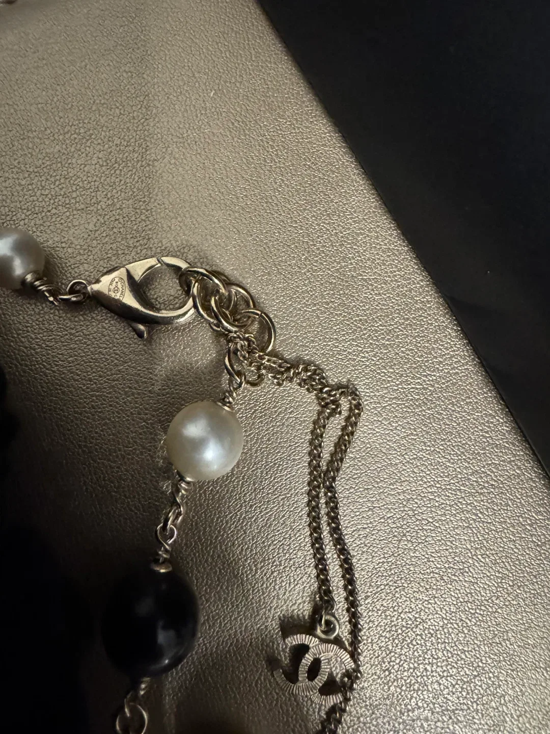 Authentic Chanel Pearl Necklace with Black and White Pearls image indicator(3)