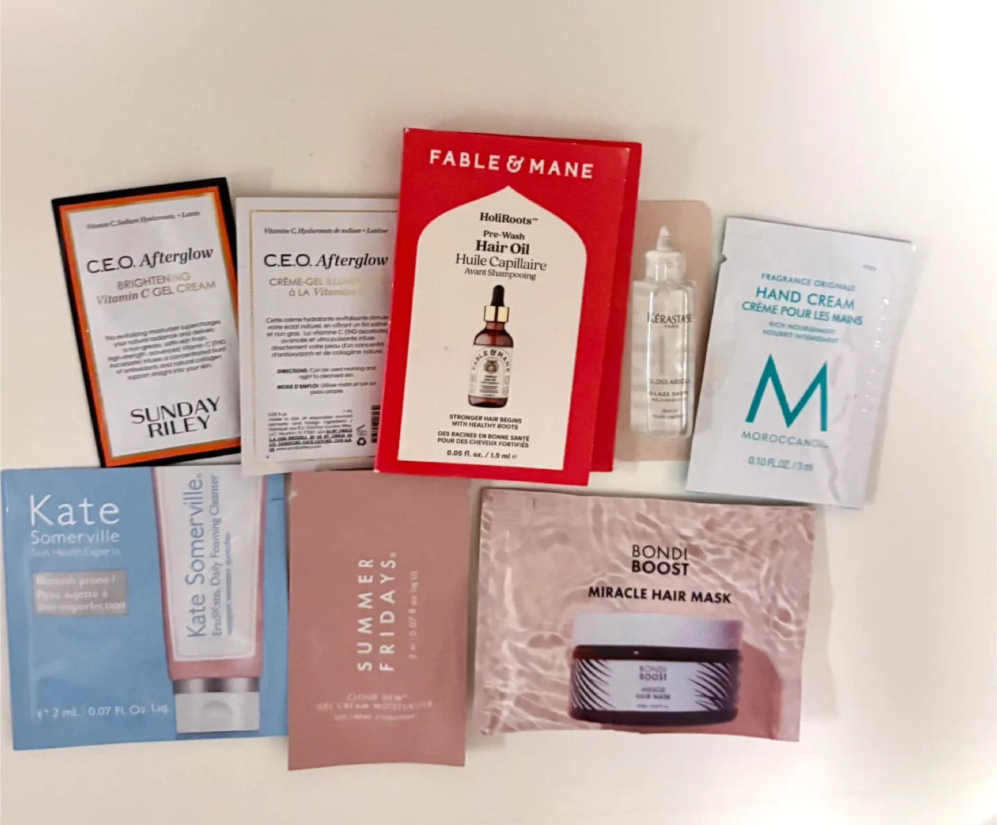 Assorted beauty sample bundle with MAC glitter pouch ✨ image indicator(2)