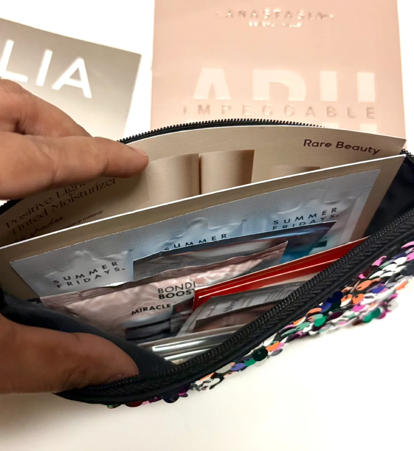 Assorted beauty sample bundle with MAC glitter pouch ✨ image indicator(6)