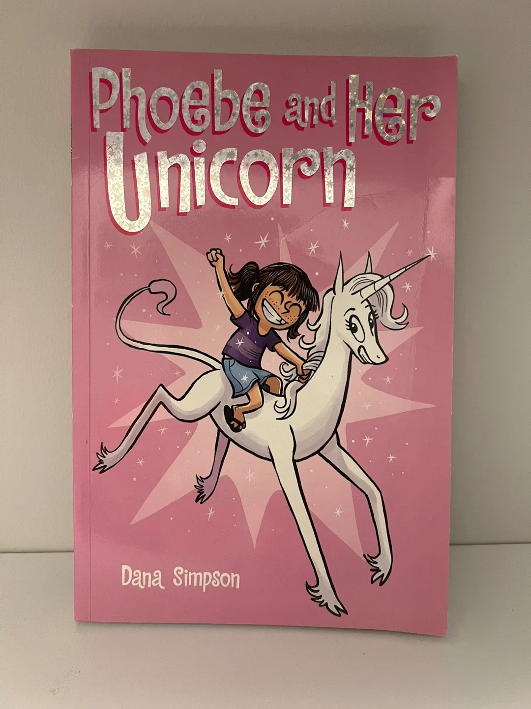 Phoebe and Her Unicorn book by Dana Simpson