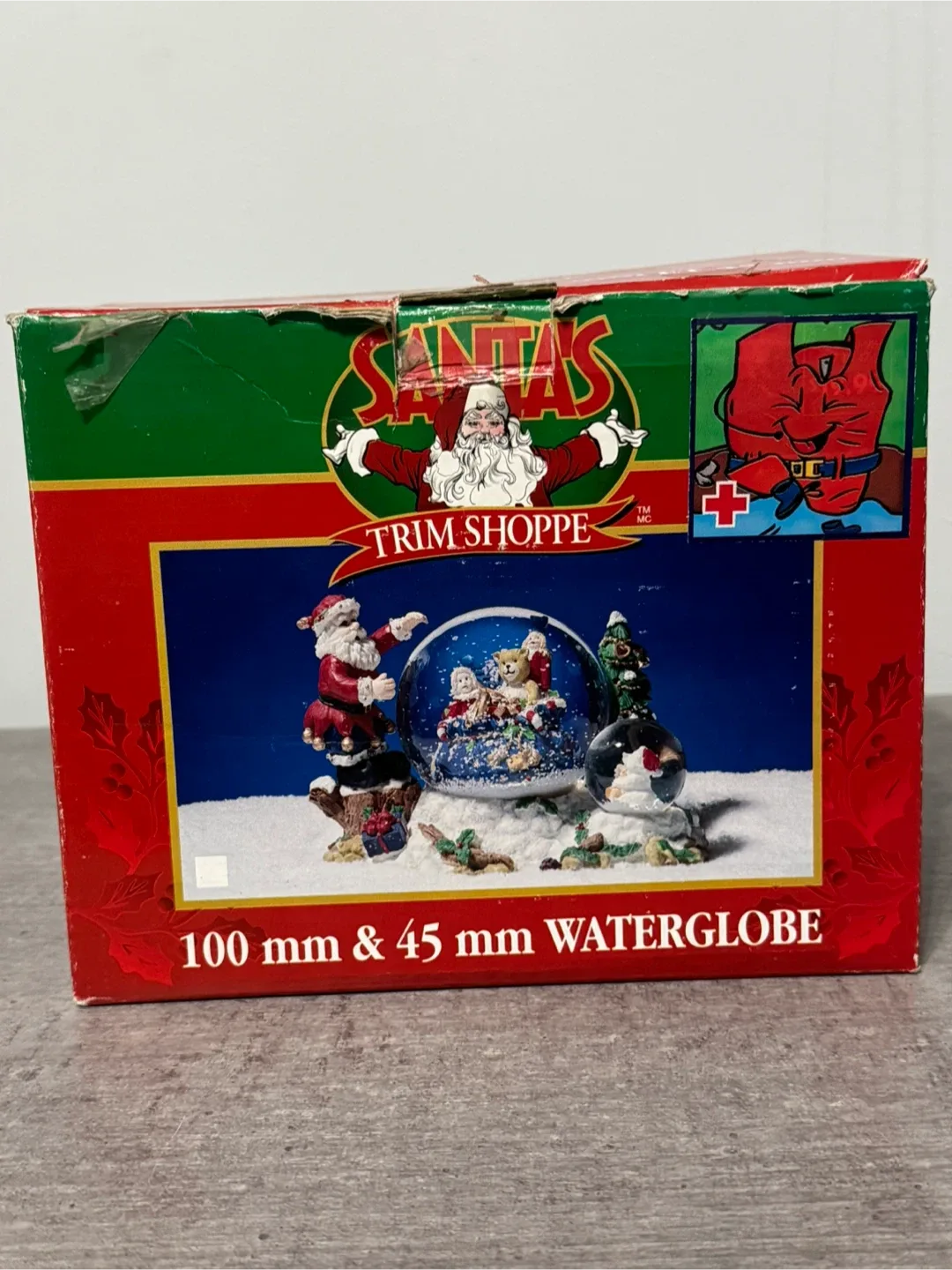 Santa's Trim Shoppe Snow Globe