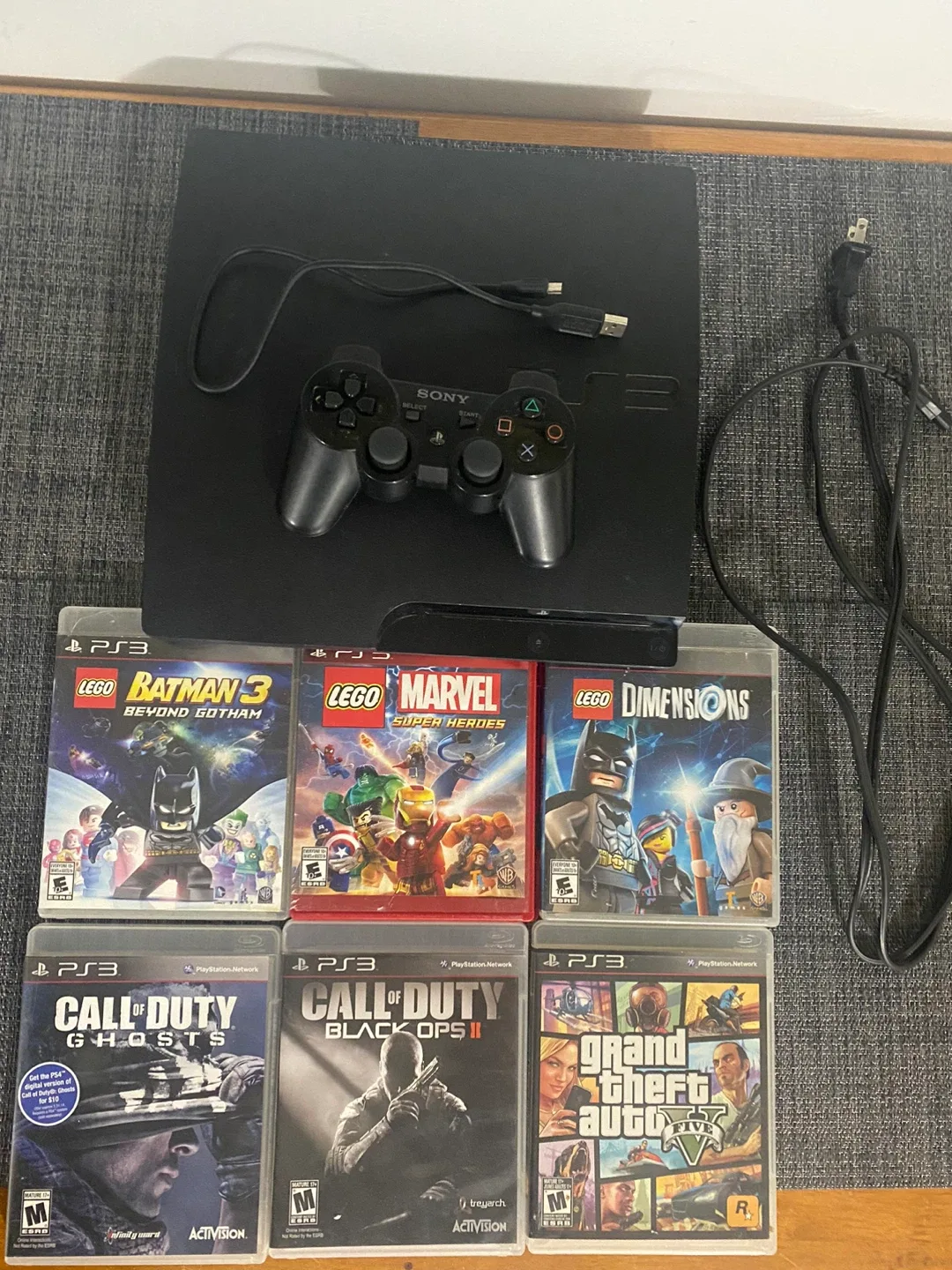 Sony PlayStation 3 with Games and controller