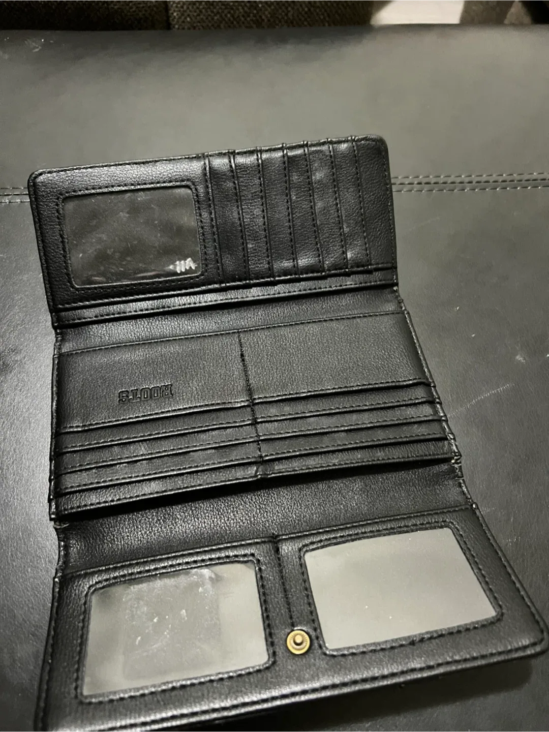 Roots Black Leather Tri-Fold Wallet image indicator(2)