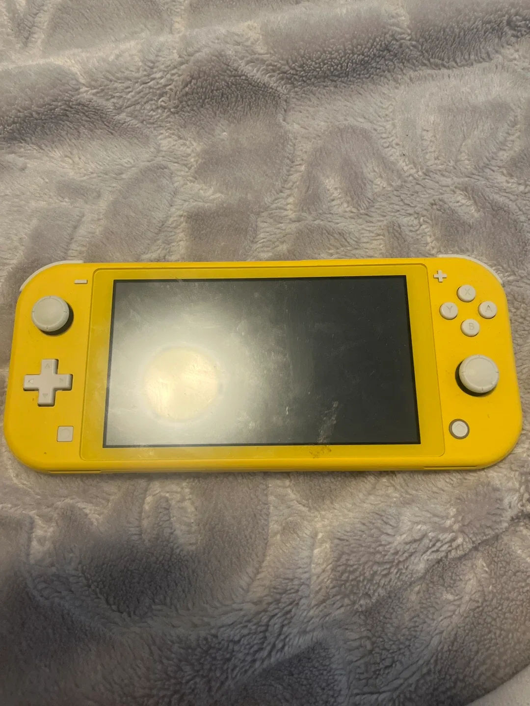 Nintendo Switch Lite (Yellow) + Super Smash Bros Ultimate
