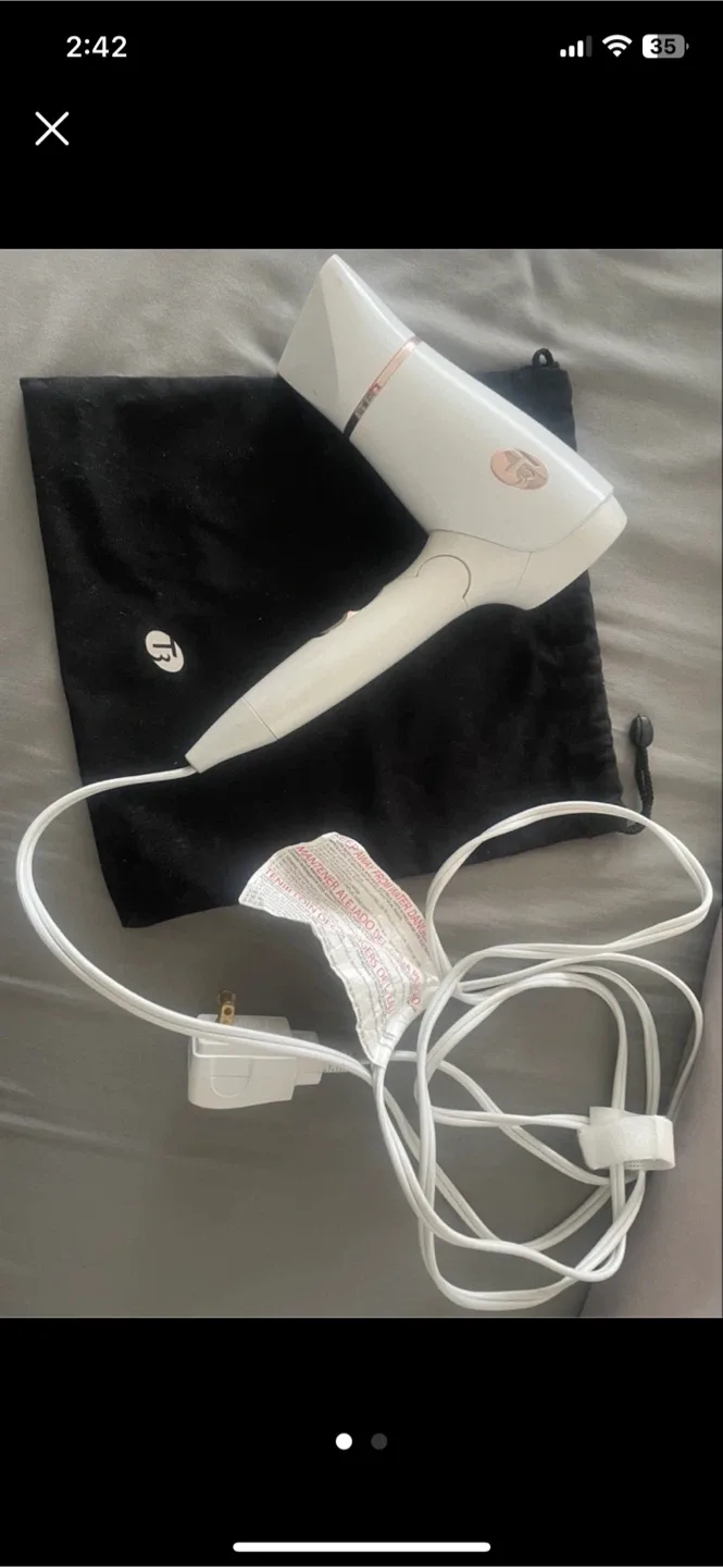 T3 Featherweight Compact Folding Hair Dryer with dual voltage