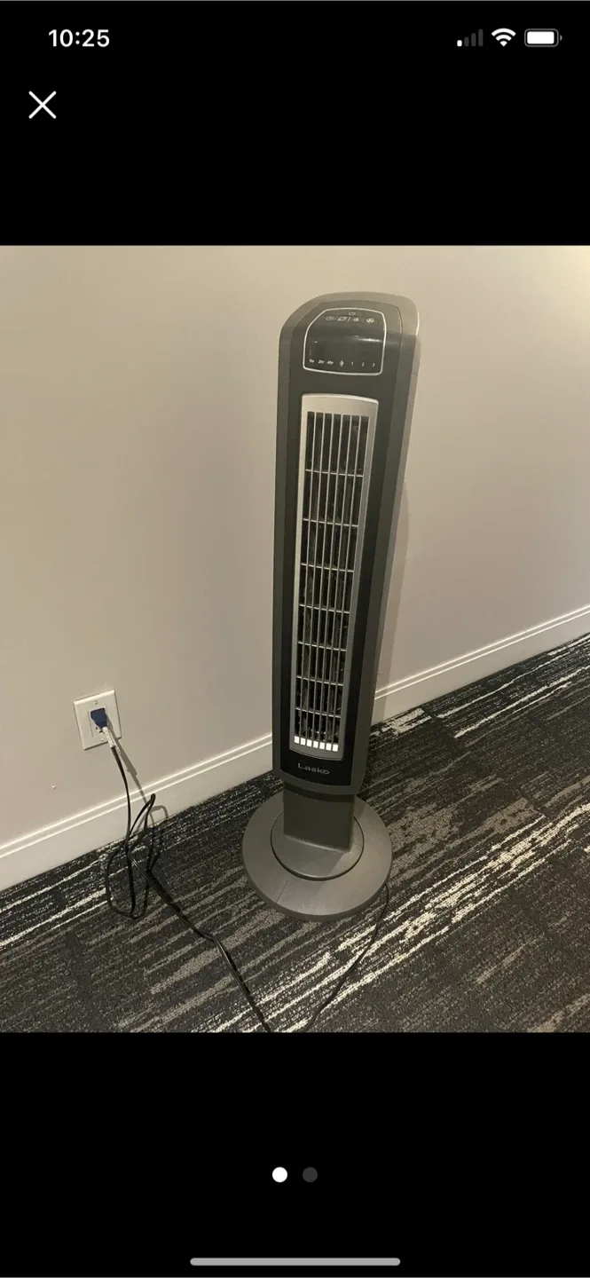 2 fans NOMA Motor Tower Fan and Lasko