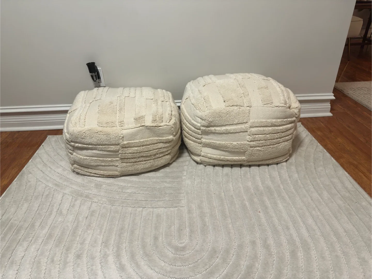 Two Off-White Poufs image indicator(3)