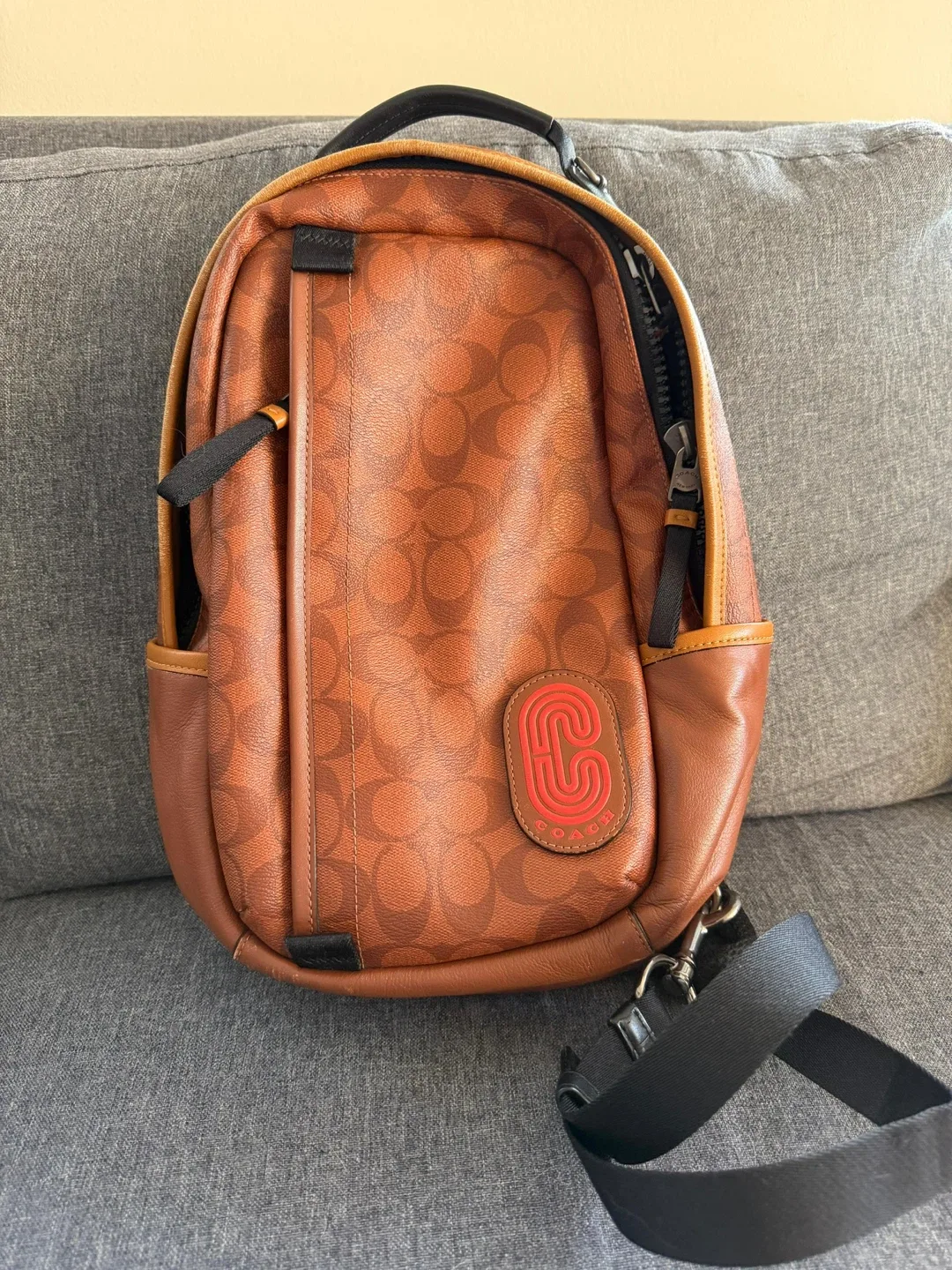 Coach Sling Backpack & Nike Air Force 1 Yellow