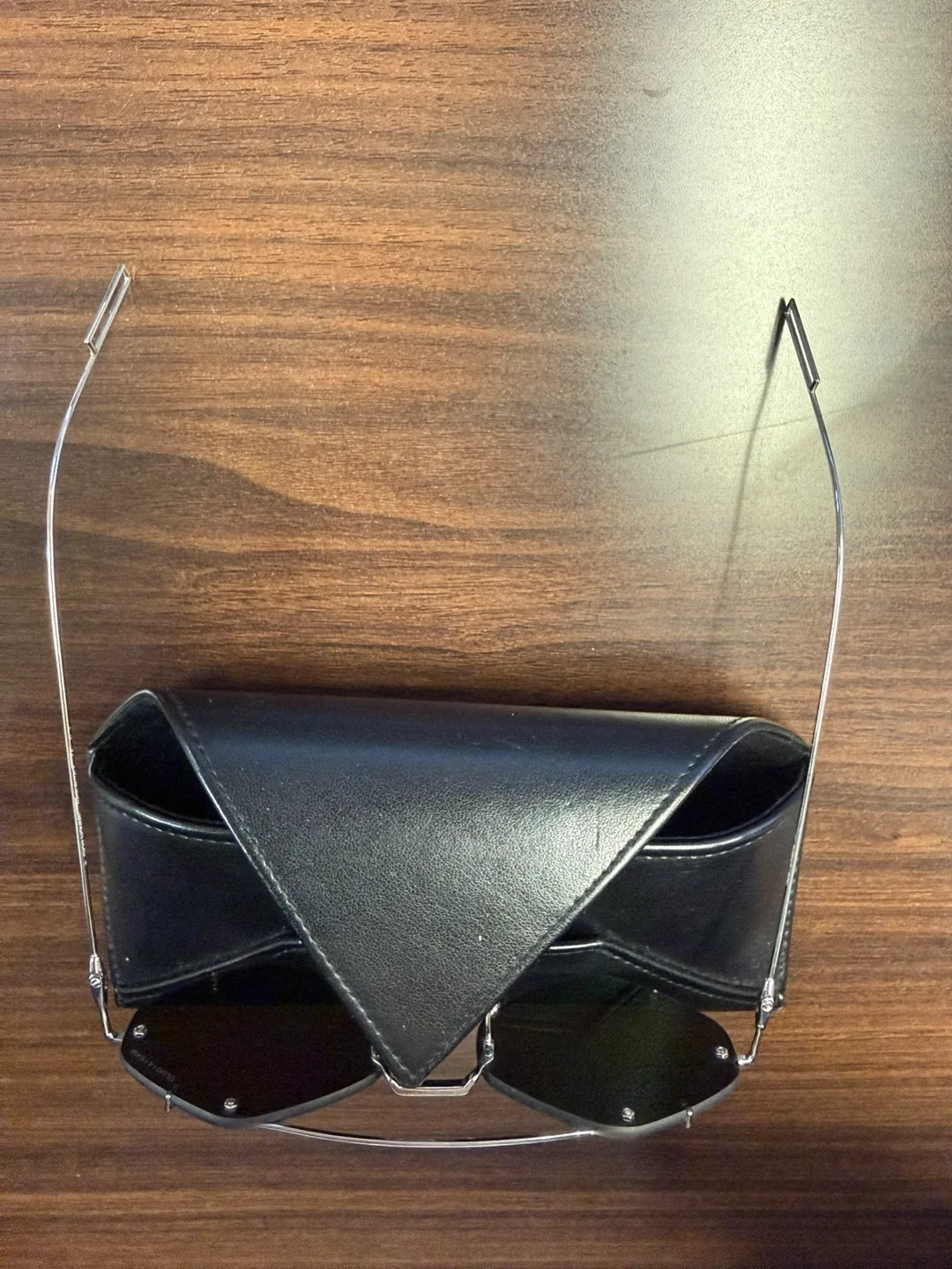Sleek Rimless Metal Sunglasses — Excellent Condition + Case image indicator(6)