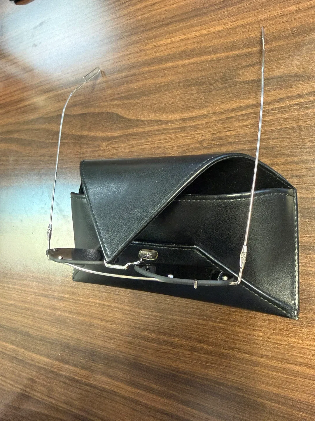 Sleek Rimless Metal Sunglasses — Excellent Condition + Case image indicator(4)