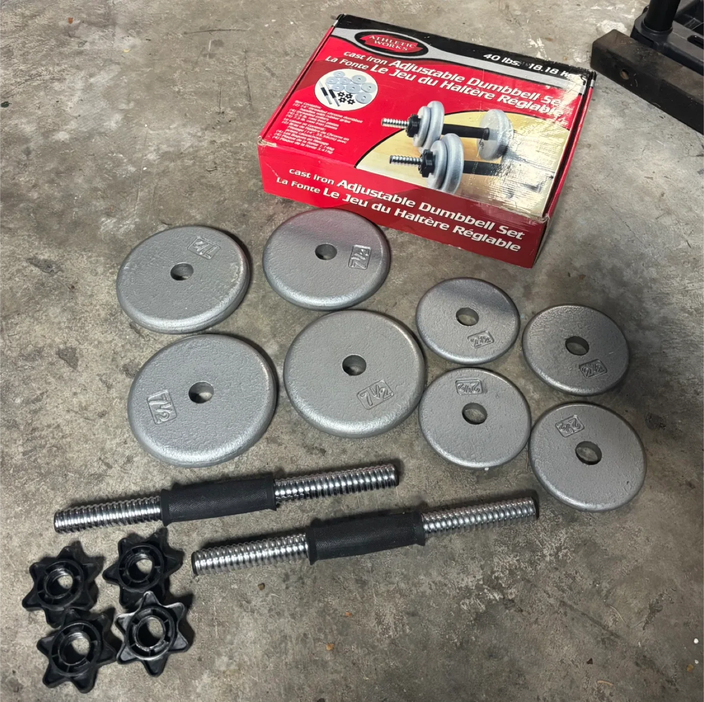 Like new Adjustable dumbbell set cast iron plates