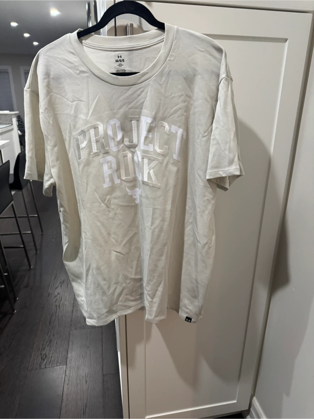 Woman’s Under Armour Project Rock T-Shirt - Large