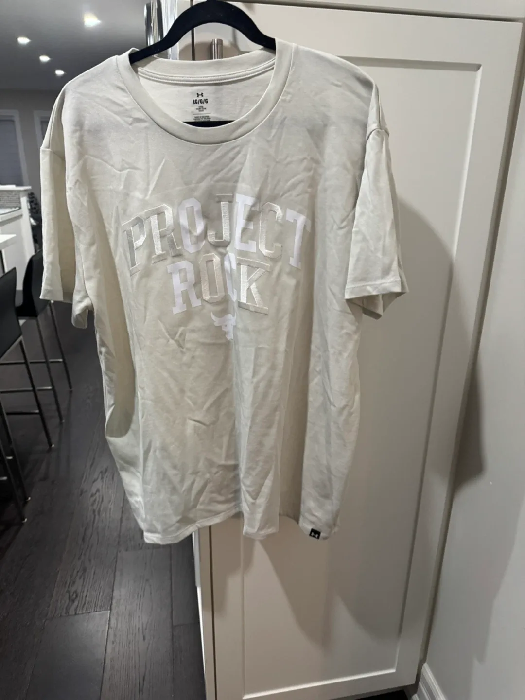 Woman’s Under Armour Project Rock T-Shirt - Large