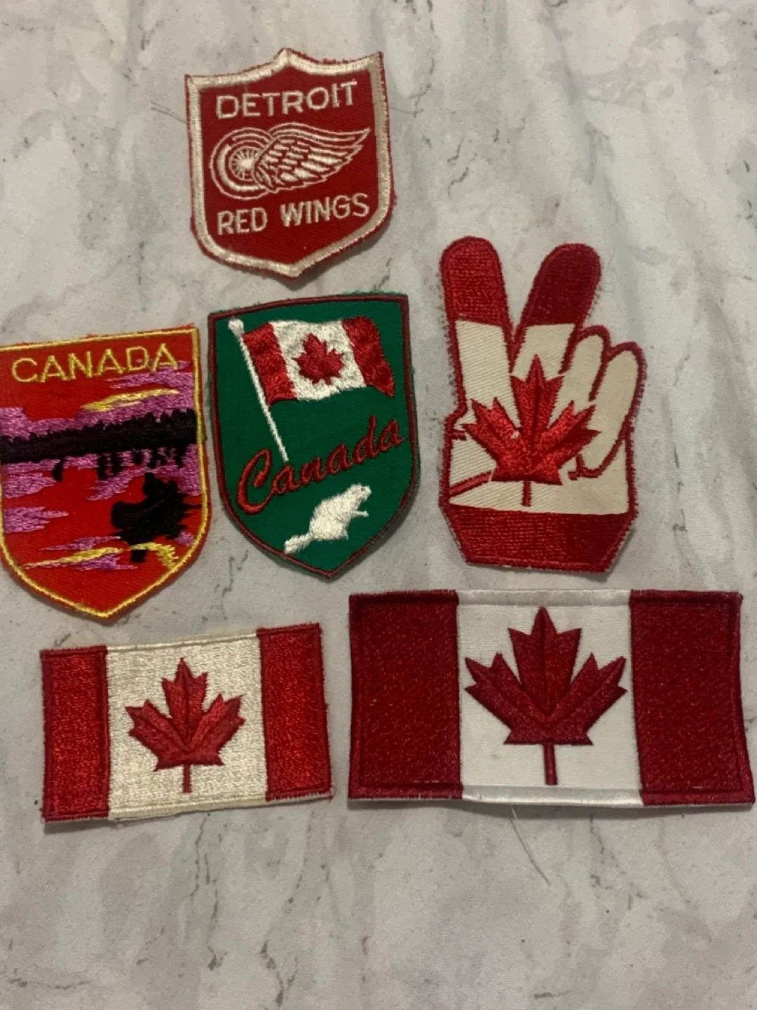 Assorted Canada patches & 1 Detroit Red Wings Patches