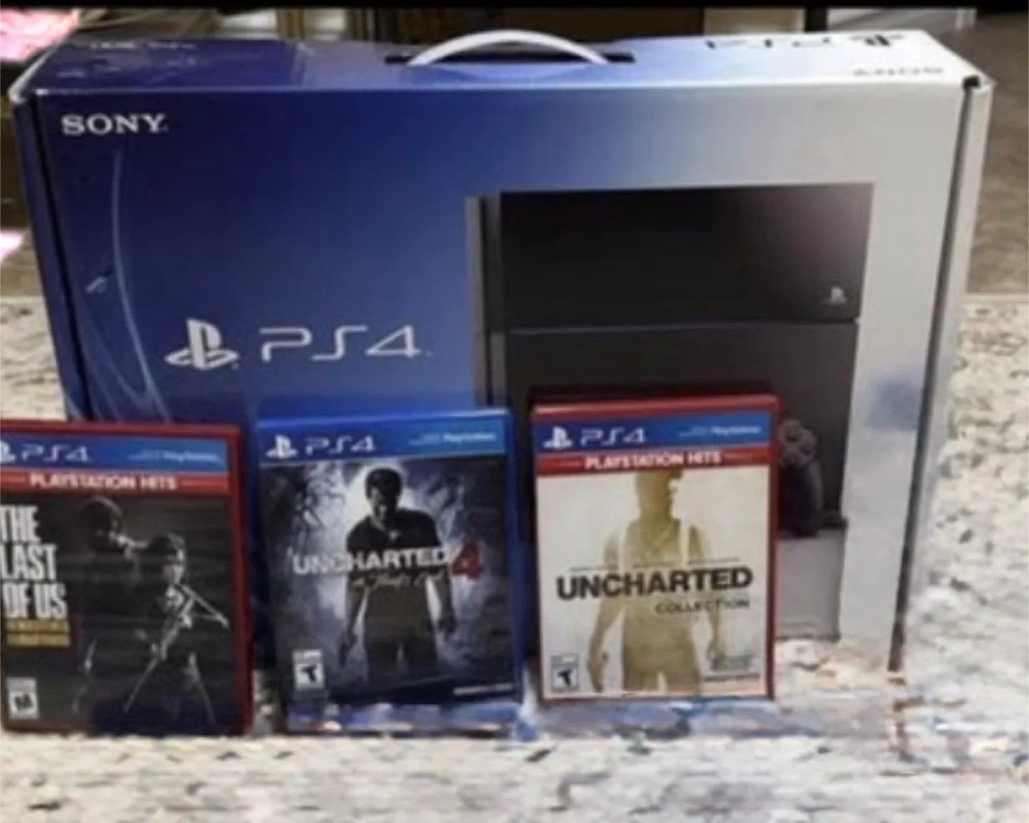 Sony PlayStation 4 (PS4) with Games
