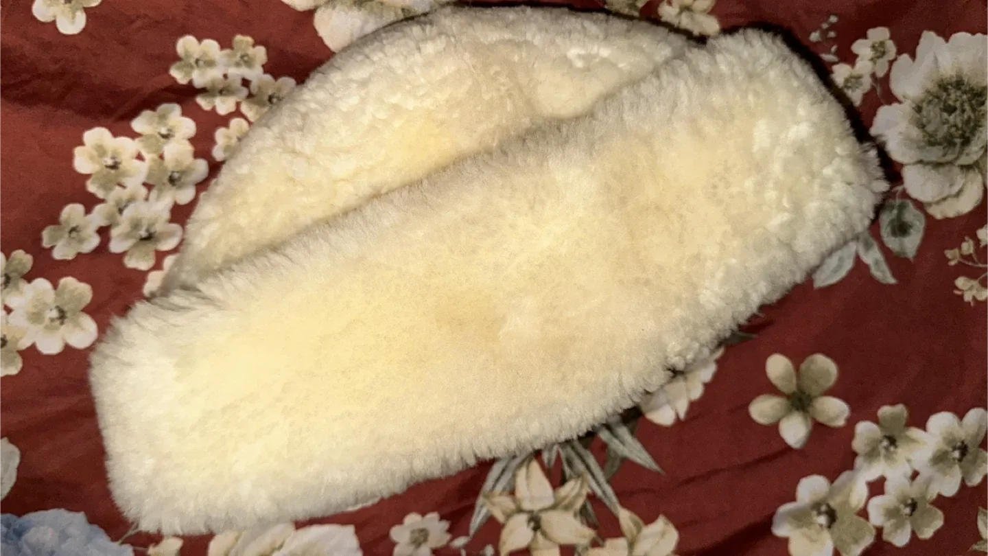 Cream-colored sheepskin Hat