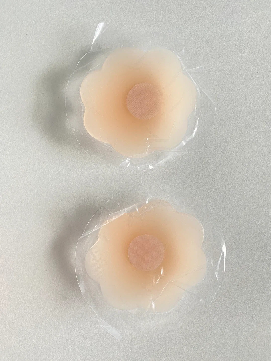 Brand NEW Rolls of Boob Tape & Reusable Flower Nipple Covers image indicator(7)