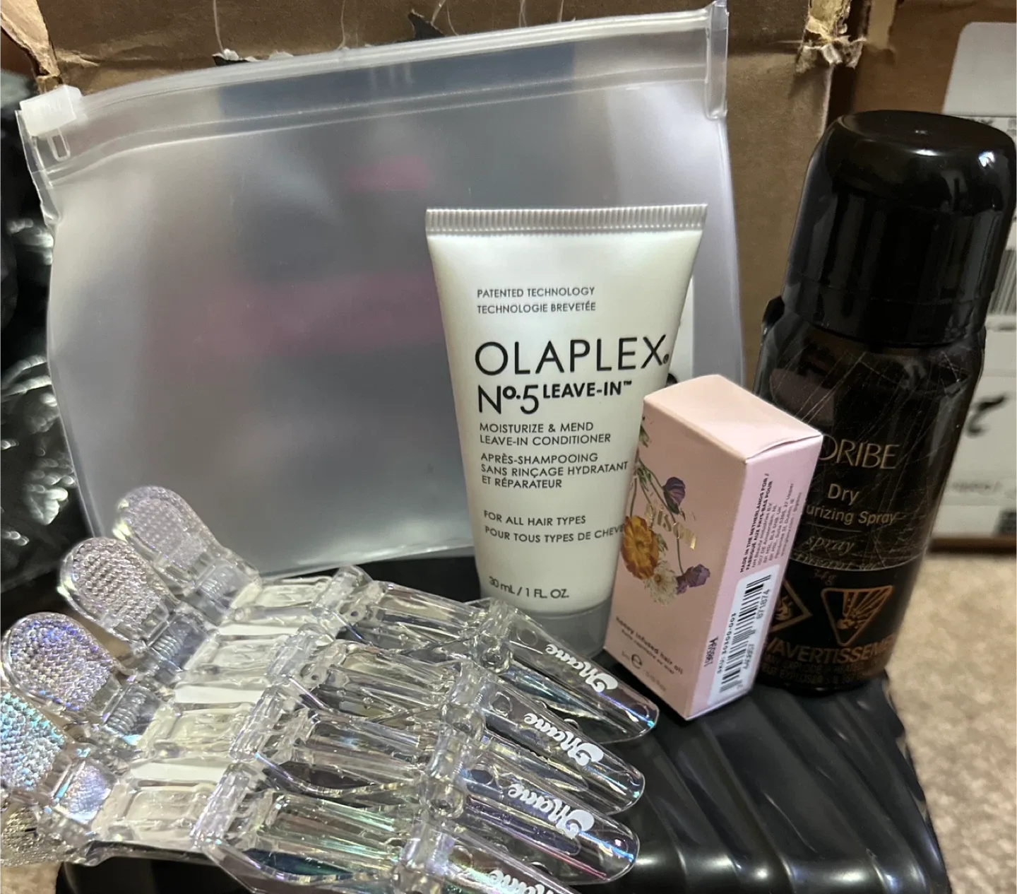 Hair Lot!: 4 Clips, Olaplex Leave-In, Oribe Spray, Gisou + Pouch image indicator(2)